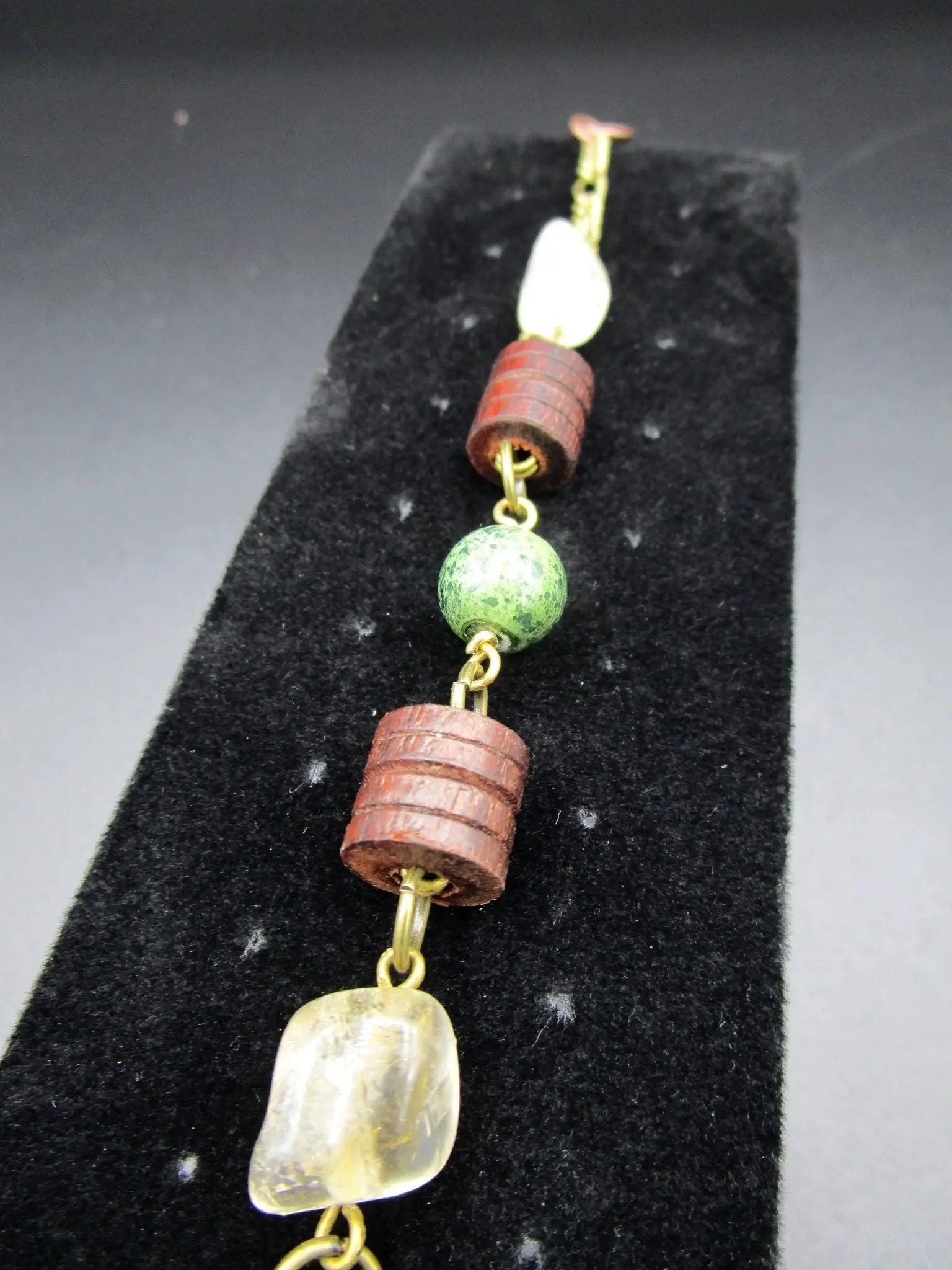 beaded bracelet with wooden beehive style beads 