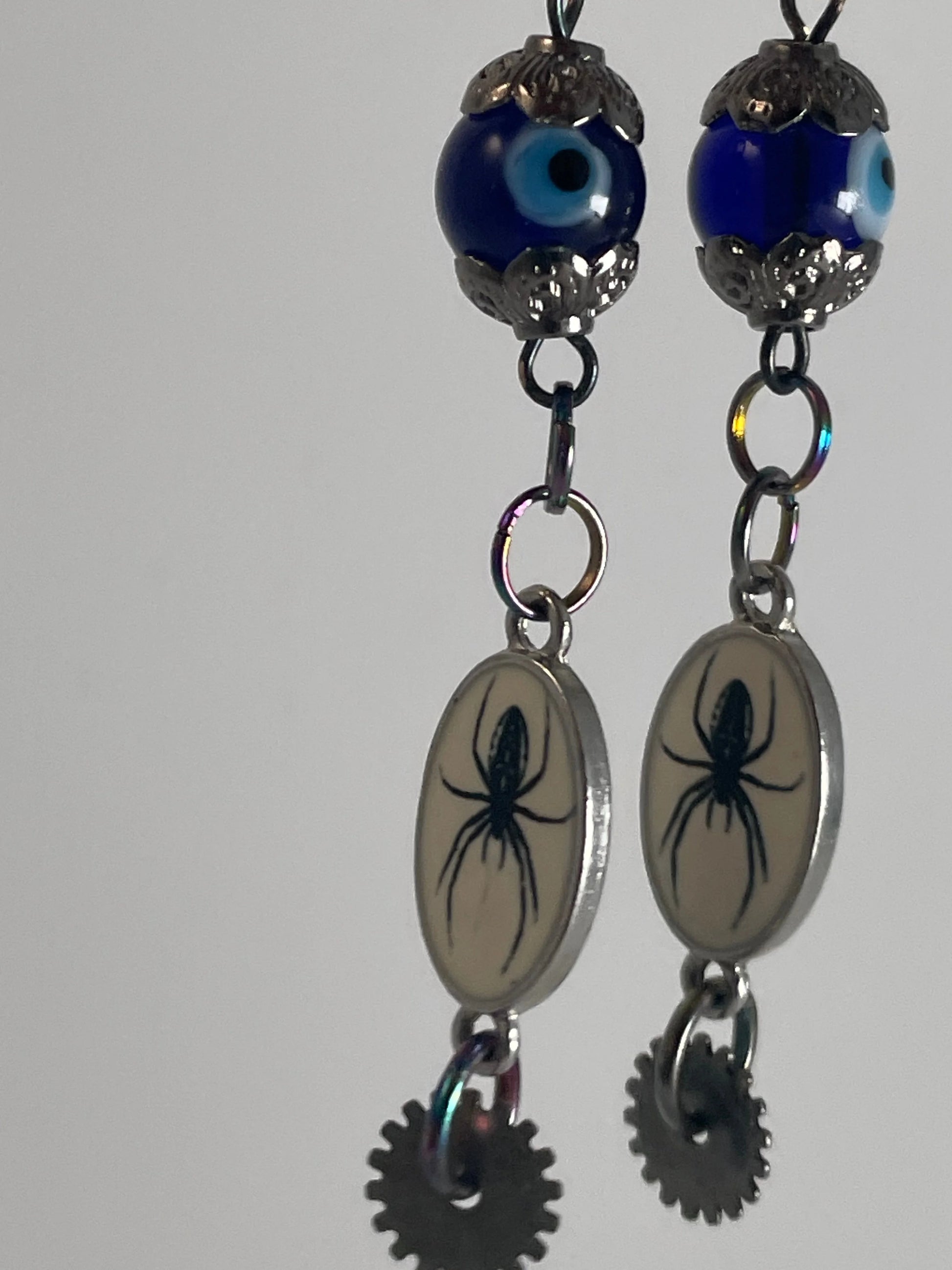 Dare to Enchant: Stunning Evil Eye & Silver Gear Earrings Urban Alcatraz ™