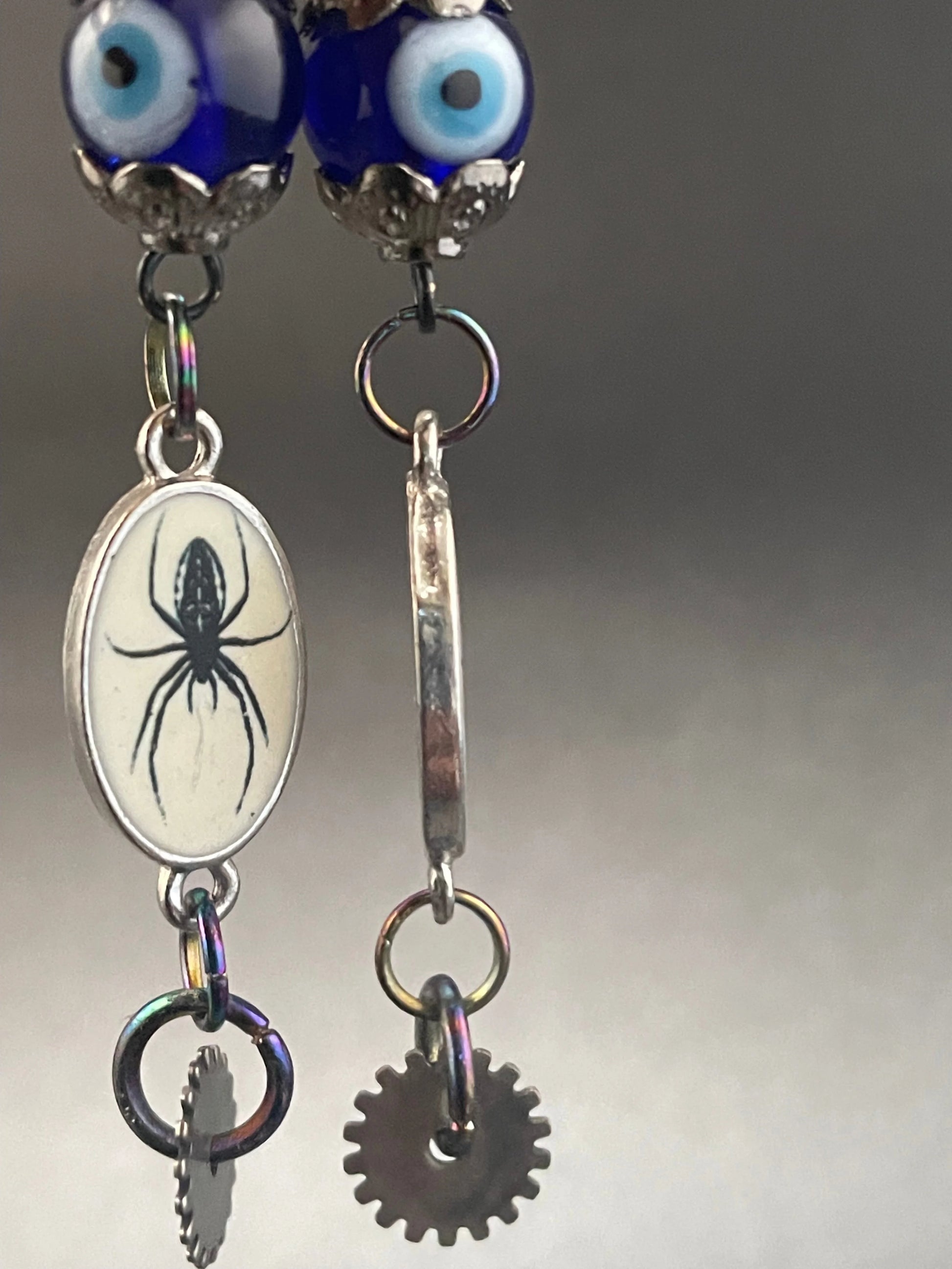 Dare to Enchant: Stunning Evil Eye & Silver Gear Earrings Urban Alcatraz ™