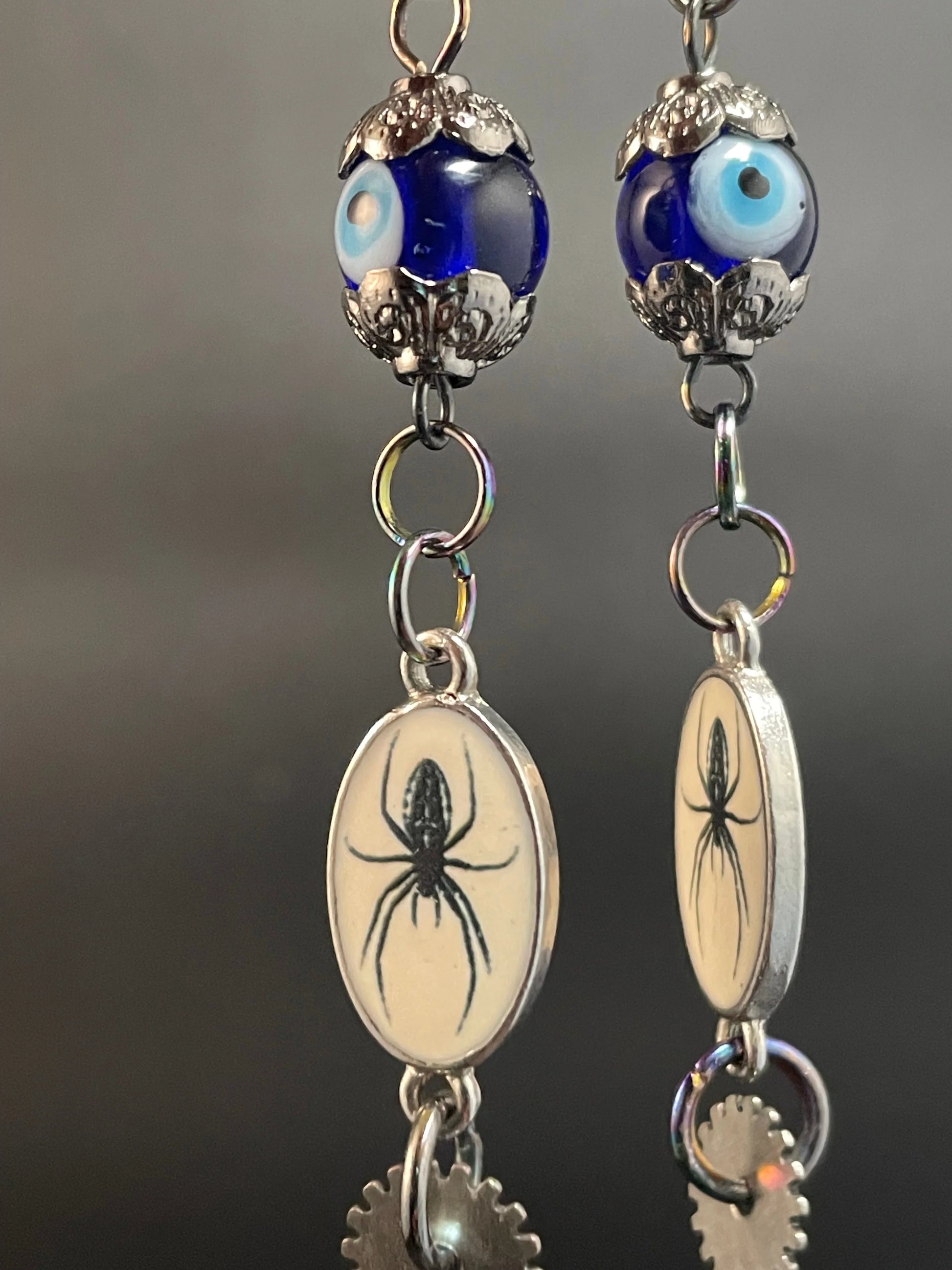 Dare to Enchant: Stunning Evil Eye & Silver Gear Earrings Urban Alcatraz ™