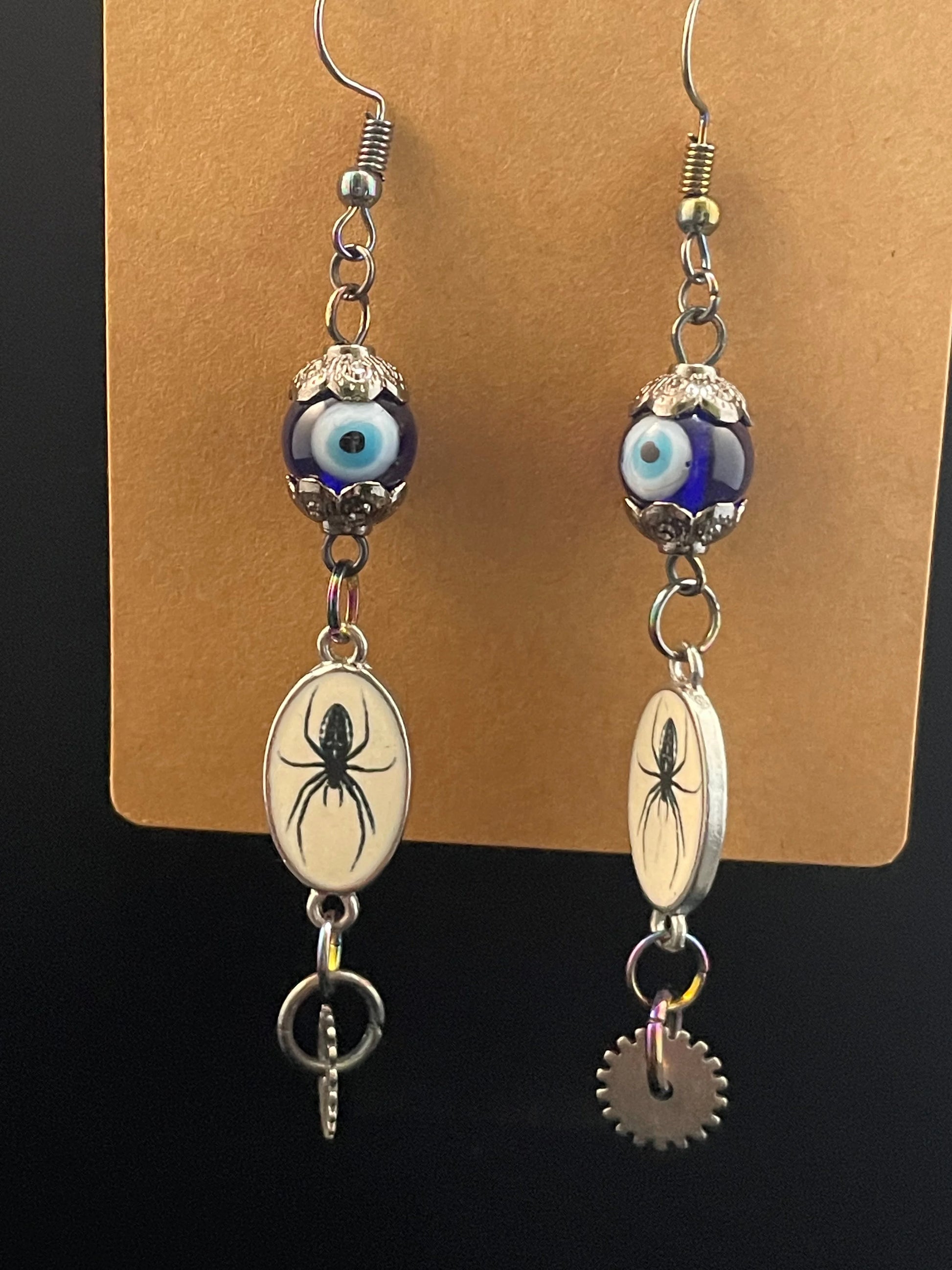 Dare to Enchant: Stunning Evil Eye & Silver Gear Earrings Urban Alcatraz ™